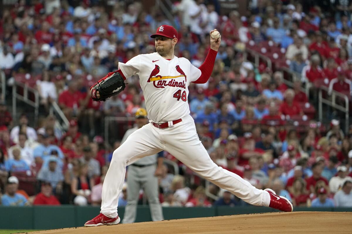St. Louis Cardinals starting pitcher Jordan Montgomery throws during the first inning of a baseball game against the Milwaukee Brewers Friday, Aug. 12, 2022, in St. Louis. (AP Photo/Jeff Roberson)