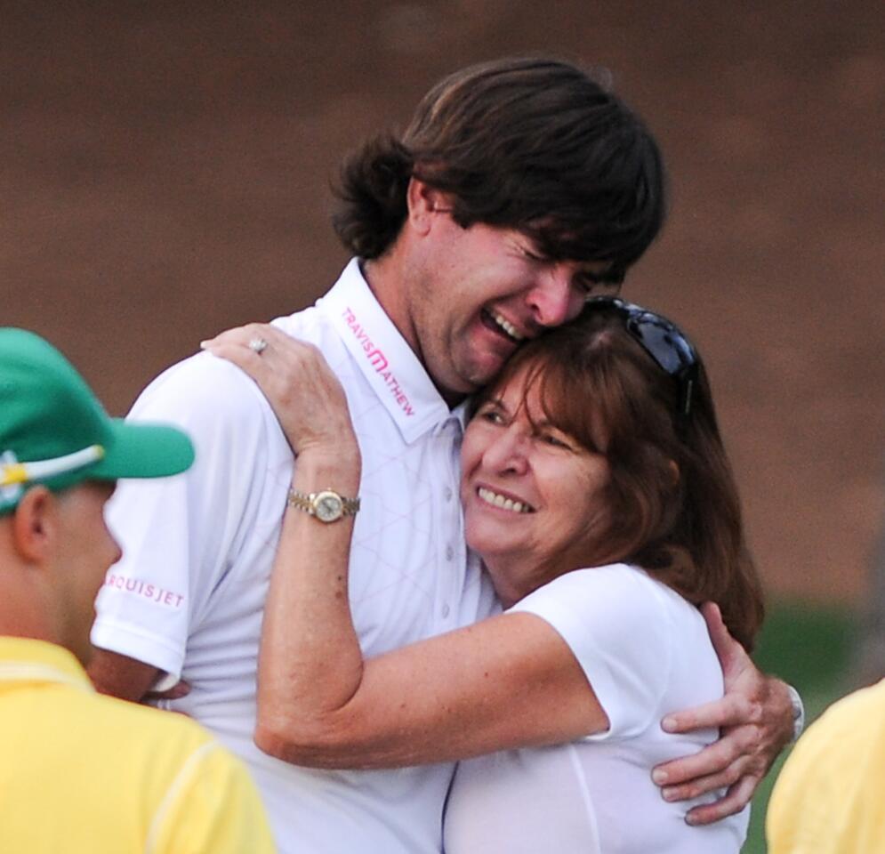 Bubba Watson of the US celebrates winning the 76th Masters golf tournament in a play-off against Louis Oosthuizen of South Africa with his mother Molly Watson at Augusta National Golf Club on April 8, 2012 in Augusta, Georgia.