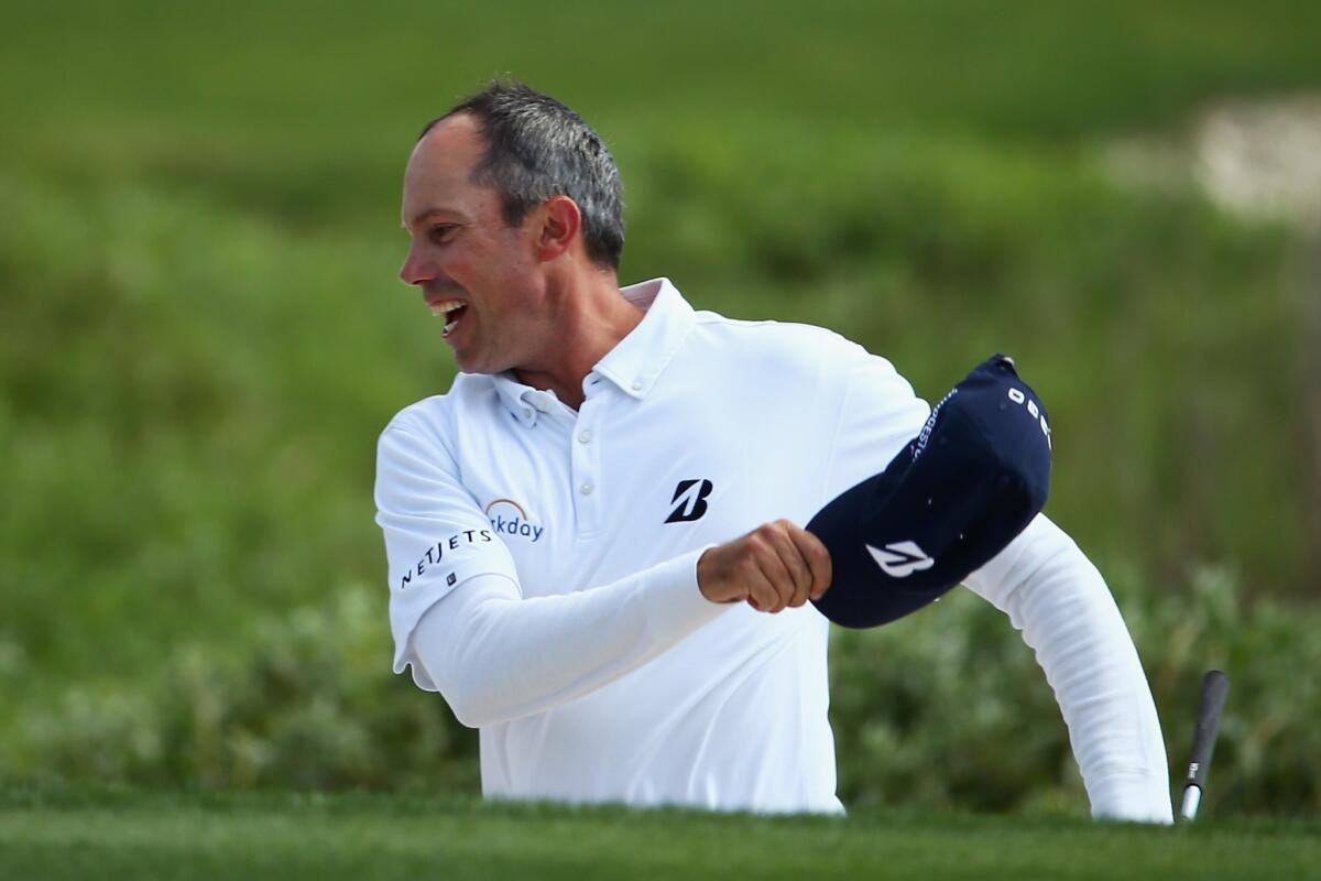 Matt Kuchar celebrates at No. 18 after chipping in for a birdie and the victory at the RBC Heritage on Sunday.