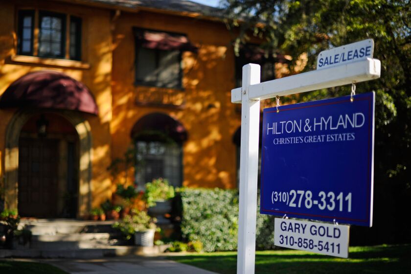 LOS ANGELES, CA - JANUARY 25: A for sale sign is seen in front of a home on January 25, 2011 in Los Angeles, California. Federal Housing Finance Agency announced today U.S. home prices fell 4.3% in November from year earlier. (Photo by Kevork Djansezian/Getty Images)