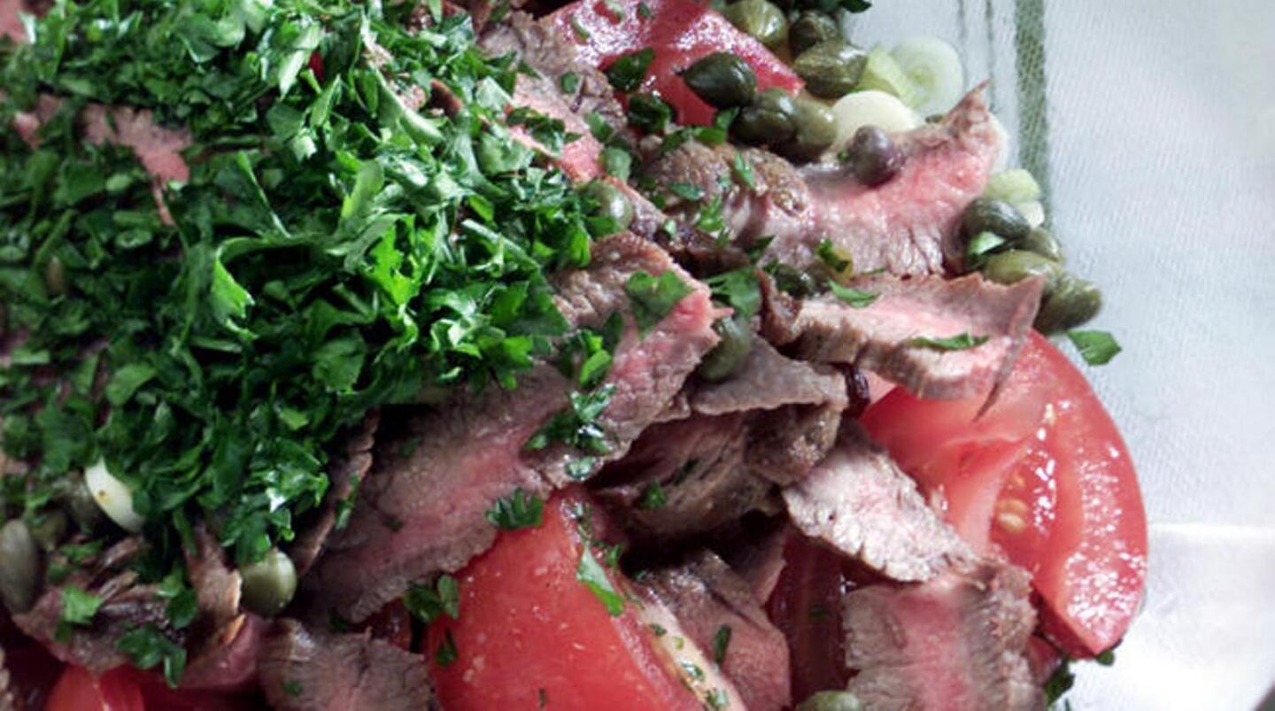 Flank steak, potato and roasted red pepper salad
