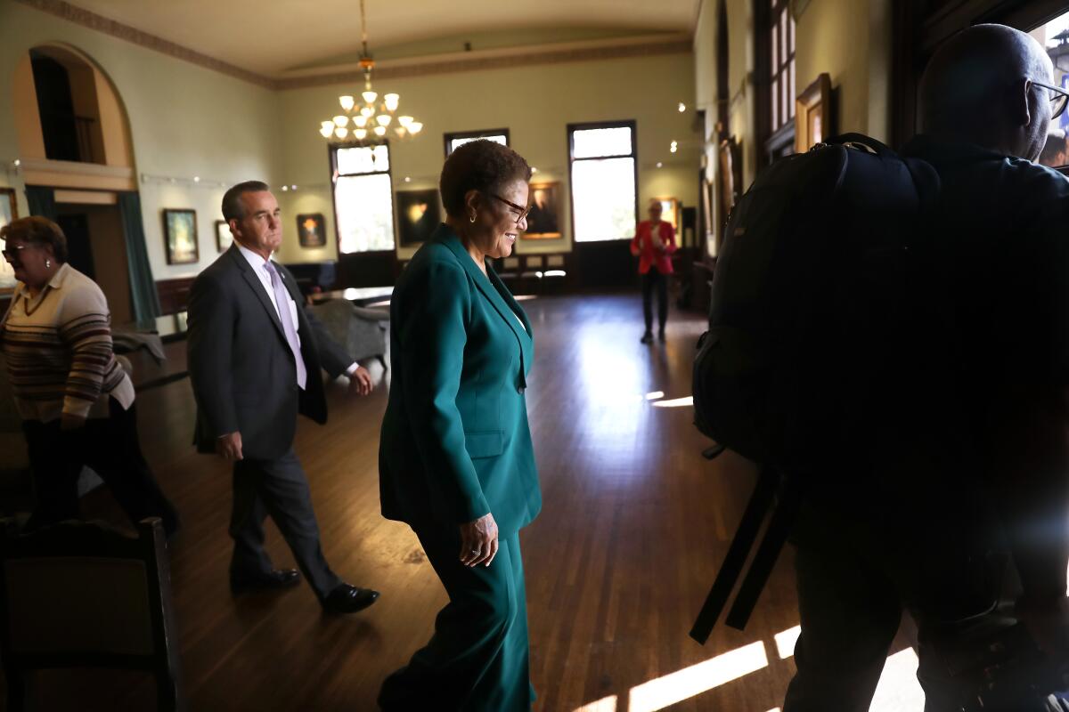 Mayor-elect Karen Bass walks out to speak  at the Wilshire Ebell Theatre in Los Angeles on Nov. 17.