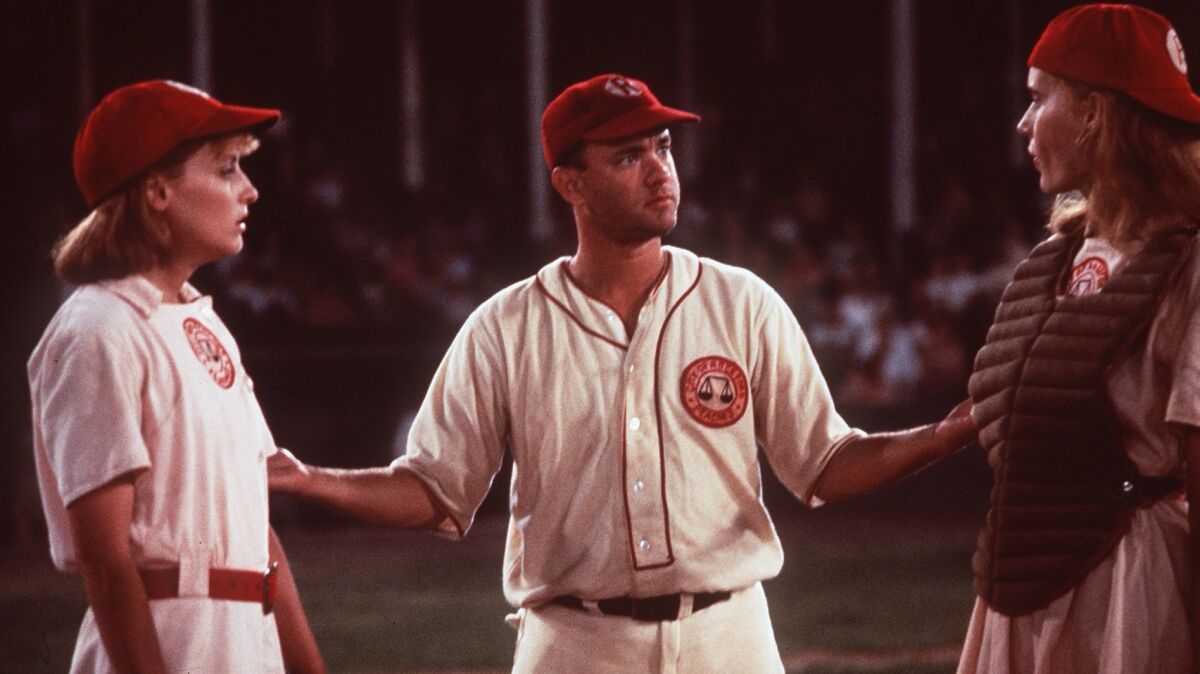 Lori Petty, left, Tom Hanks and Geena Davis in "A League of Their Own." (Louis Goldman / Columbia Pictures)