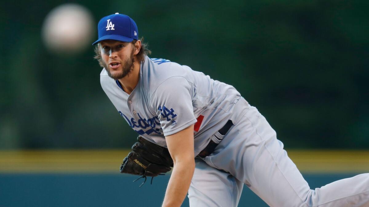 Dodgers' Clayton Kershaw pitches against Colorado on Friday.