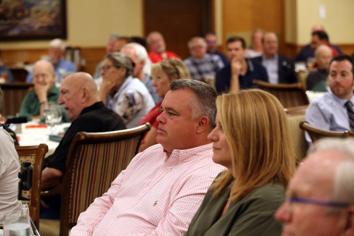 Guests listen to guest speaker Ronert Horry, former NBA basketball player and winner of seven NBA championship titles, during the YMCA Quarterback Club Meeting at the Oakmont Country Club banquet facility in Glendale, Ca., Tuesday, October 15, 2019. (photo by James Carbone)