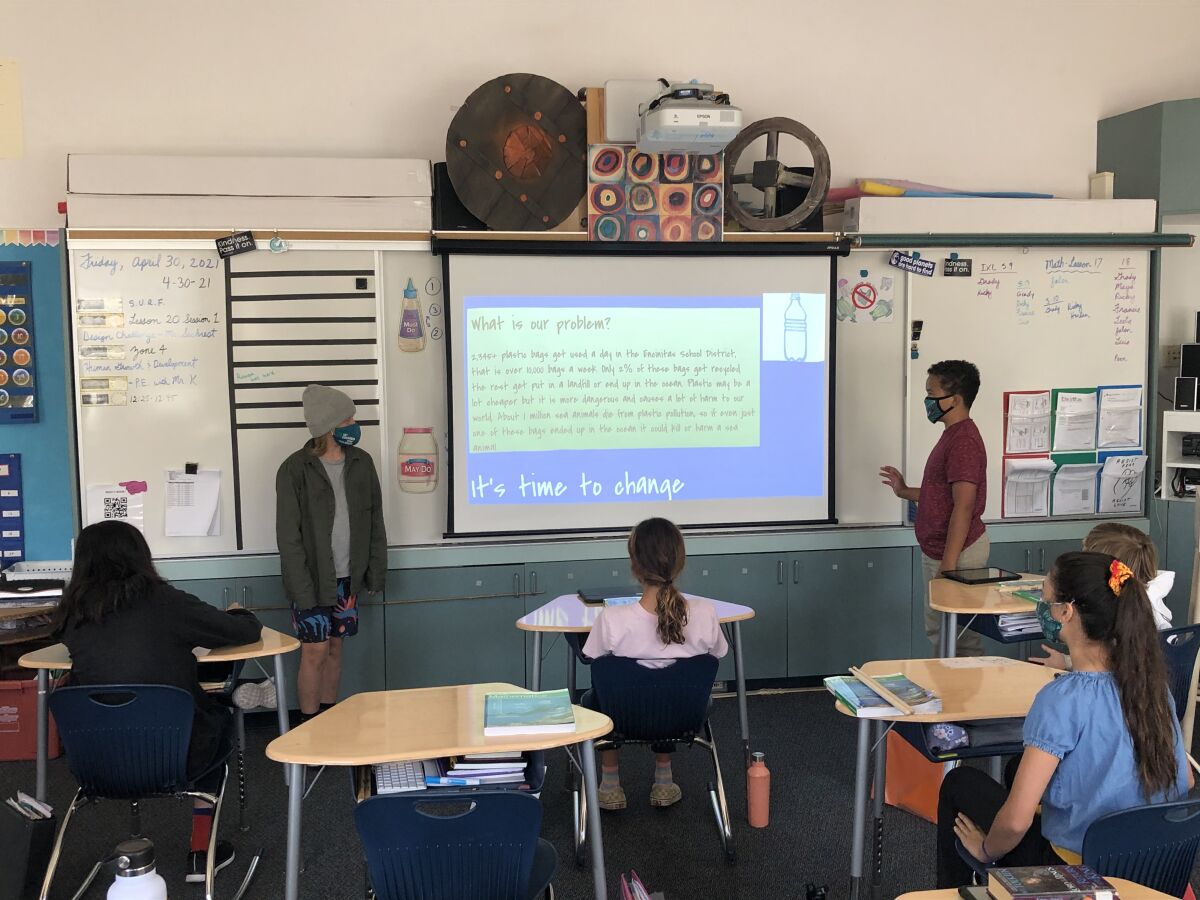 Paul Ecke sixth graders make their pitch to switch to paper bags.