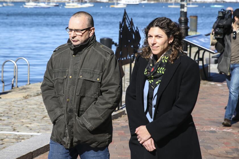 BOSTON, MA - MARCH 25: Igor Dvorskiy, left, director of a private elementary and high school in Los Angeles and standardized test administrator for the College Board and ACT Inc., is pictured outside the John Joseph Moakley United State Courthouse in Boston on March 25, 2019. A dozen sports coaches and test administrators who are accused in a massive college admissions scandal appeared in a federal courtroom in Boston for the first time Monday, pleading not guilty to taking part in a multimillion-dollar scheme to help the children of wealthy clients get into selective colleges. Each defendant was arraigned on a charge of racketeering conspiracy, a crime that carries a sentence of up to 20 years in prison and a $250,000 fine. (Photo by Nathan Klima for The Boston Globe via Getty Images)