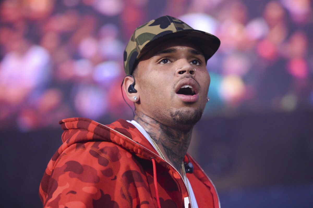 Chris Brown performs in New Jersey in 2015. The performer posted a picture on Instagram early last year of his pet capuchin monkey, which state authorities said he had without a permit.