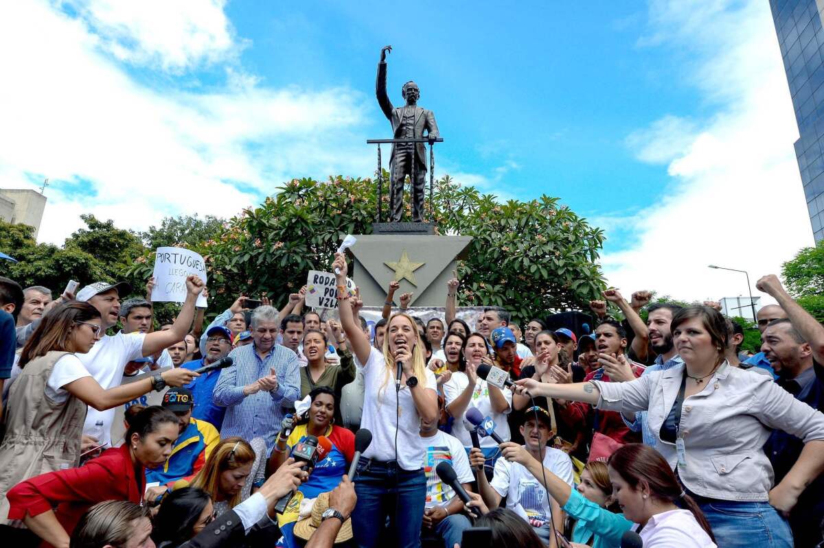 Lilian Tintori, wife of Venezuelan jailed opposition leader Leopoldo Lopez, speaks during a demonstration in Caracas on August 31, 2016.