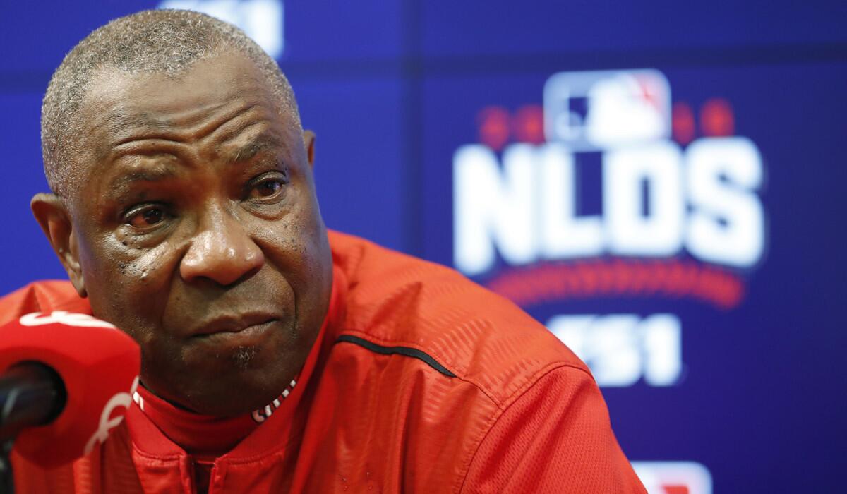 Washington Nationals Manager Dusty Baker listens to a question during a news conference after batting practice Tuesday.