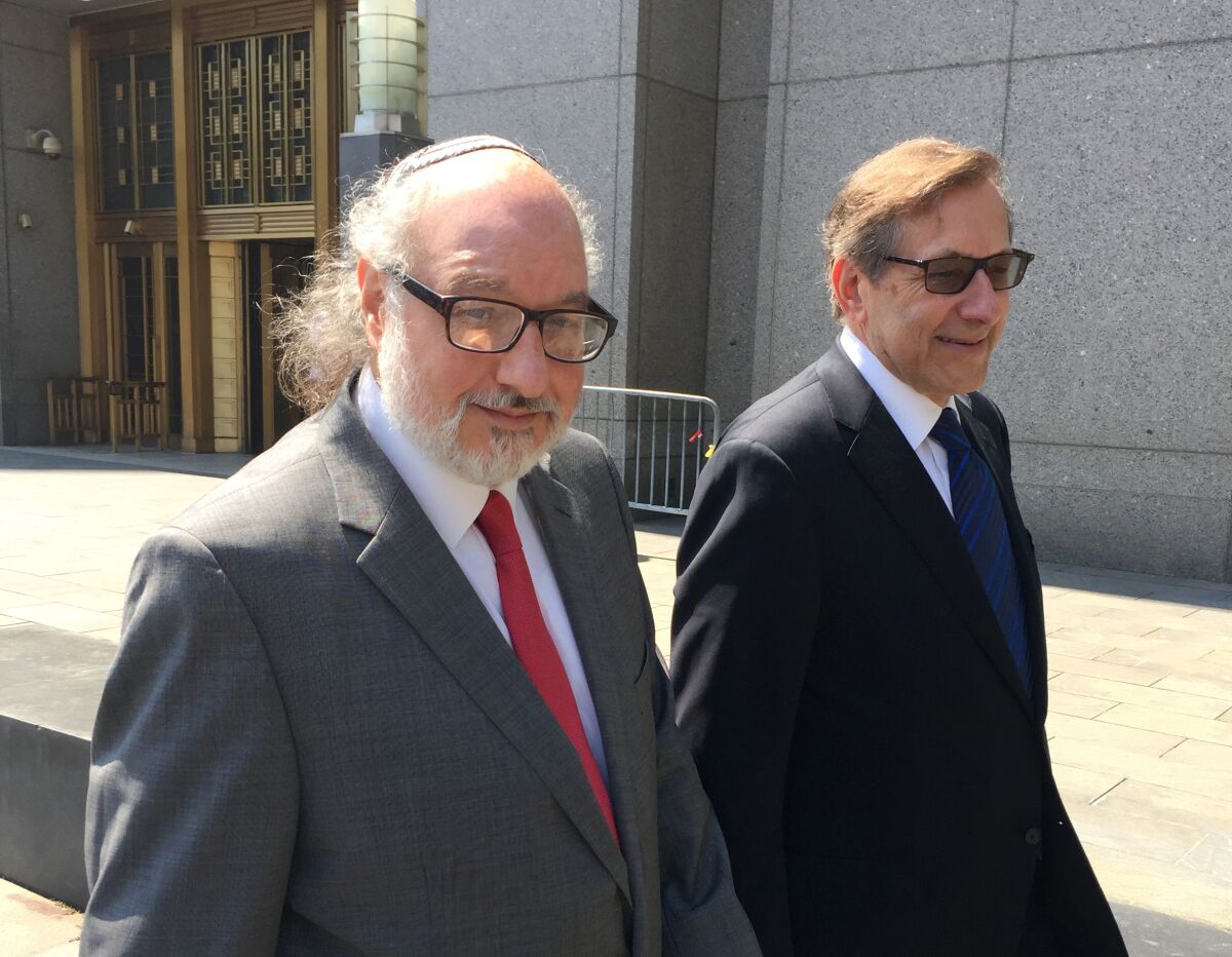 Jonathan Pollard with his lawyer