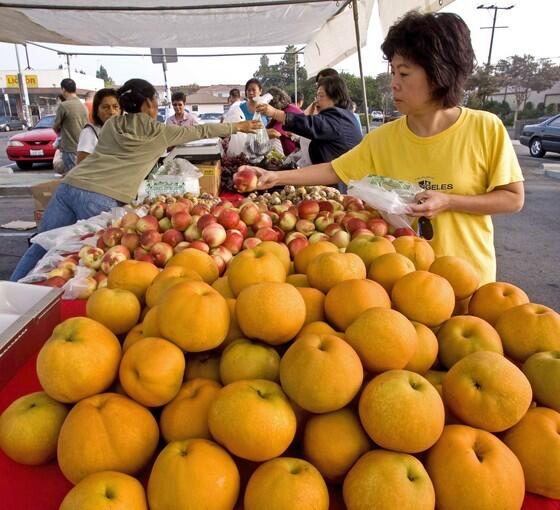 Atago Asian pears, along with white nectarines, Elephant Heart plums, Asian eggplant and grapes, grown by GB Farms of Reedley, on sale at the Monterey Park farmers market. Click here for more.