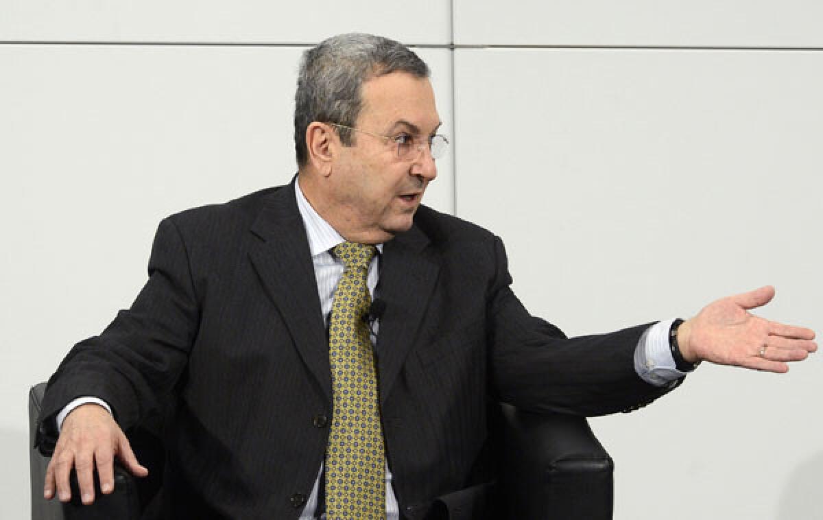 Israel's Deputy Prime Minister and Minister of Defence Ehud Barak gestures during a podium discussion on the third day of the 49th Munich Security Conference.