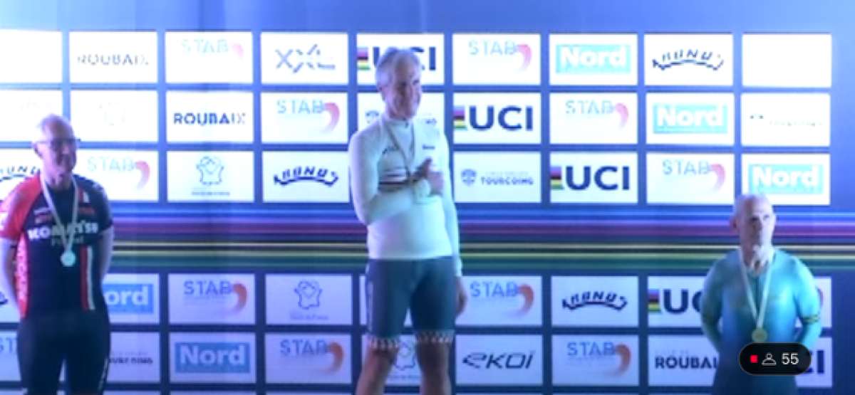 David Stanton stands atop the podium at the UCI Masters Track World Championships in France.
