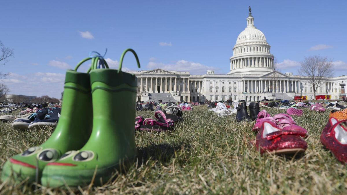 Seven thousand pairs of shoes, one for every child killed by gun violence since the Sandy Hook school shooting, were placed on the Capitol lawn on March 13.