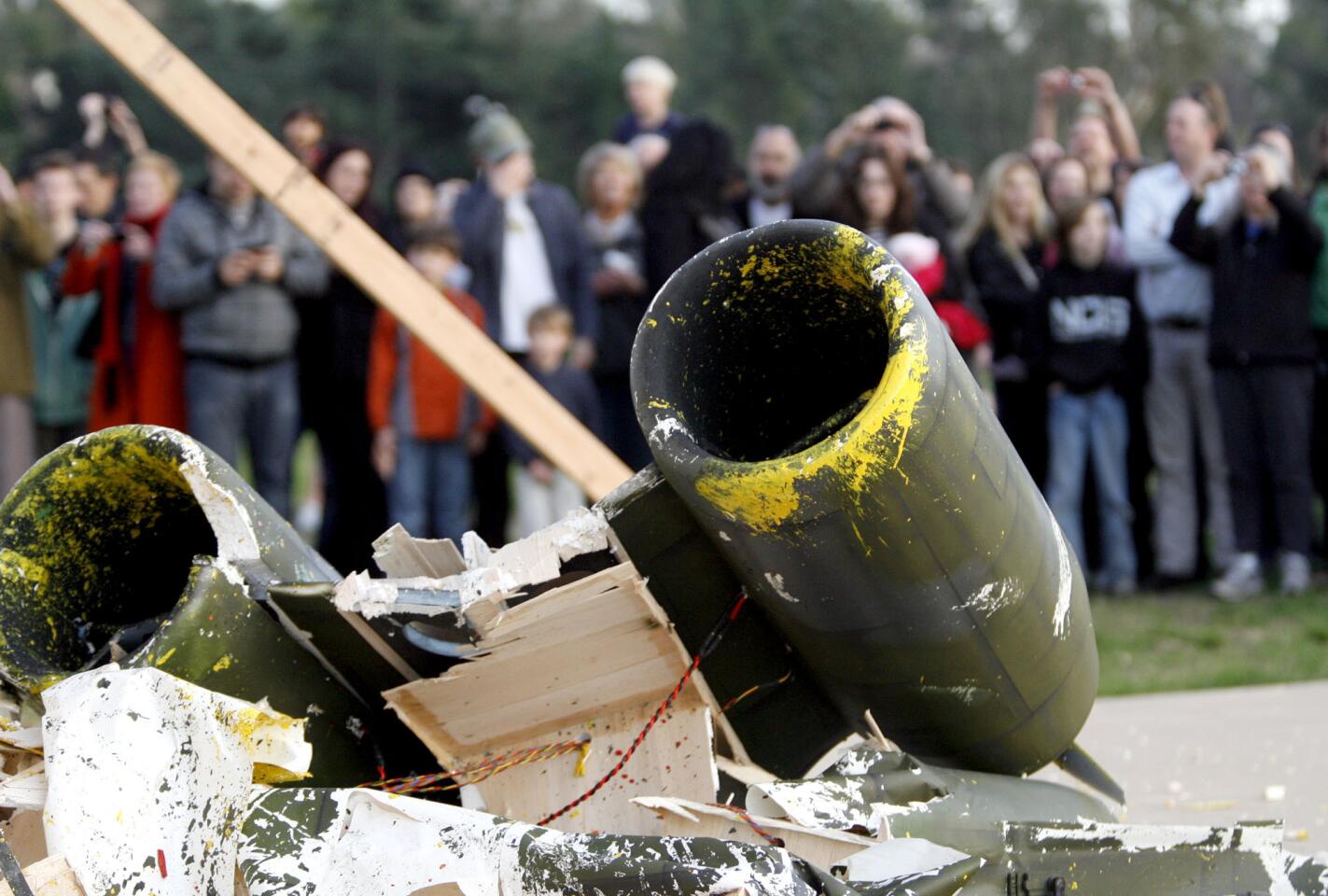 Photo Gallery: Art plane crashes, paints canvas at Rose Bowl