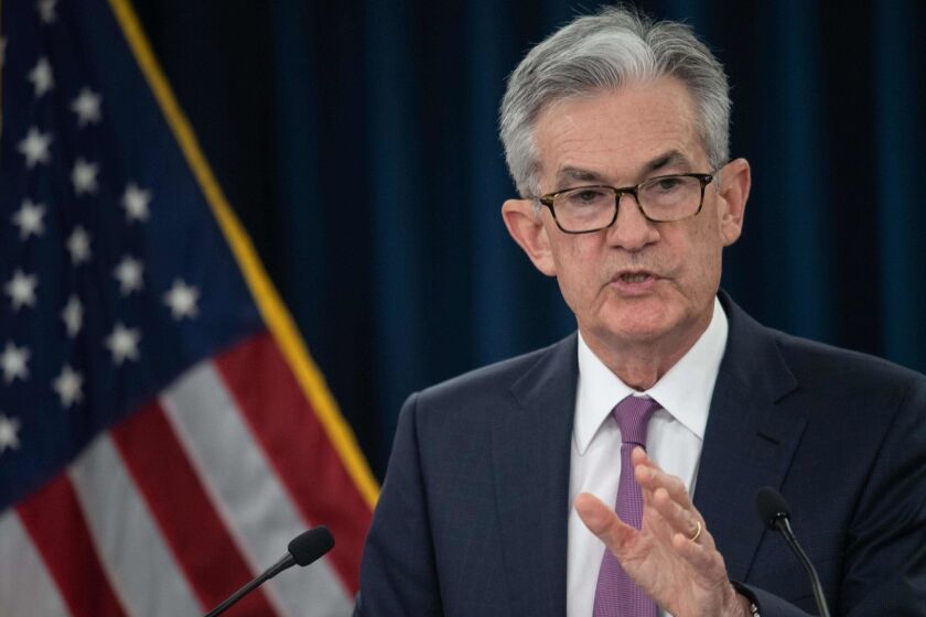 (FILES) In this file photo taken on June 19, 2019 Federal Reserve Board Chairman Jerome Powell speaks at a news conference after a Federal Open Market Committee meeting in Washington, DC. - Federal Reserve chief Jerome Powell's job at the head of the US central bank is safe, White House economic advisor Larry Kudlow said July 9, 2019.President Donald Trump has lambasted Powell repeatedly for raising interest rates, which he complains is undercutting his attempts to supercharge the US economy. Asked at an economic forum if Powell's job was said, Kudlow said, "Yes, I believe it is. There is no effort to remove him -- I will say that unequivocally -- at the present time." (Photo by NICHOLAS KAMM / AFP)NICHOLAS KAMM/AFP/Getty Images ** OUTS - ELSENT, FPG, CM - OUTS * NM, PH, VA if sourced by CT, LA or MoD **