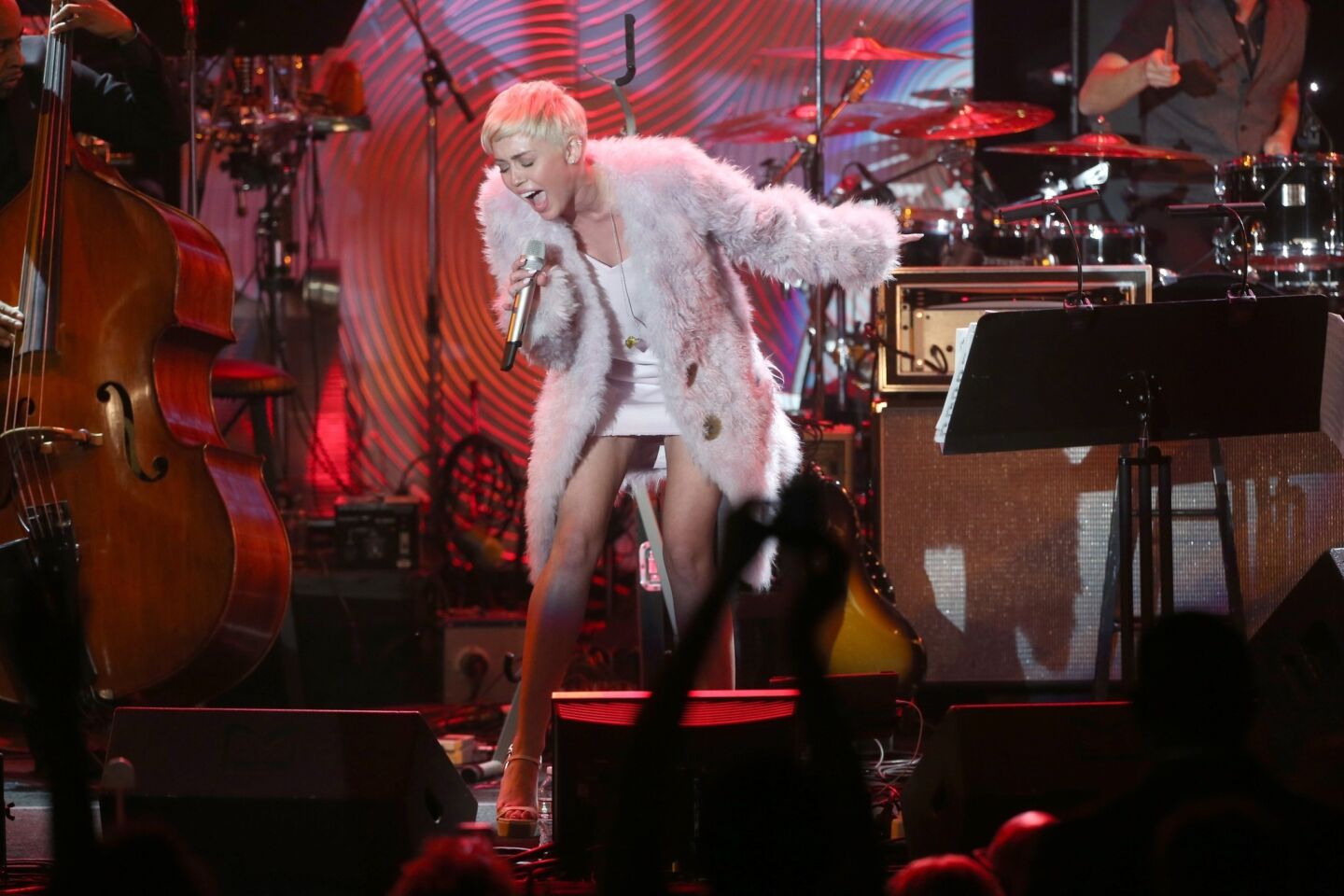 While Miley didn't pick up any 2014 Grammy nominations, she was invited to perform at Clive Davis' Pre-Grammy Gala. She wore a pink fur coat and donned a simple blond pixie cut, yet her performance was anything but subtle. She offered up a conservative take of "Jolene" by Dolly Parton in her three-song set.