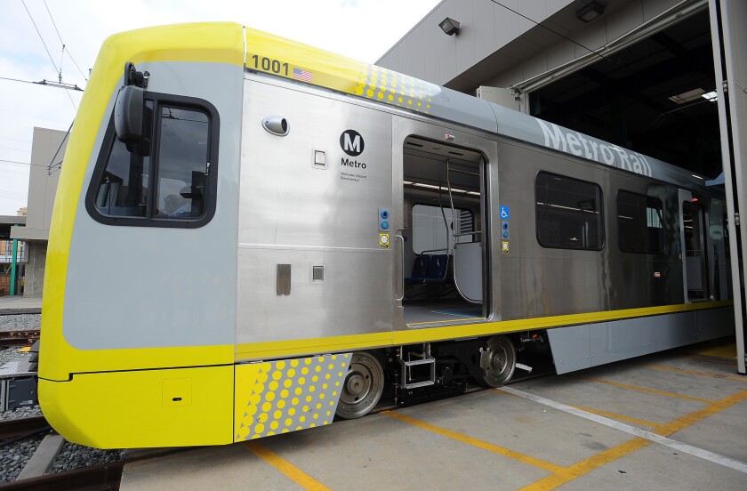 The Metropolitan Transit Authority unveils a new P3010 rail car made by Kinkisharyo at an event in Lawndale in October. The company announced an agreement with organized labor Tuesday that cleared the way for a new manufacturing facility at its plant in Palmdale.