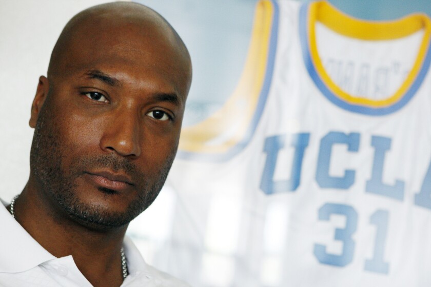 Former UCLA basketball player Ed O'Bannon sits in his Henderson, Nev., office in 2010.