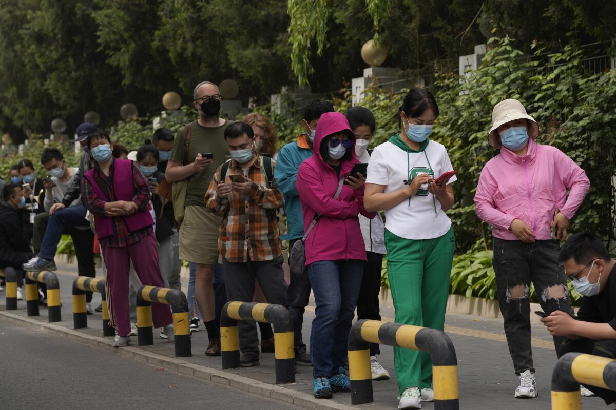 Residents lining up for mass coronavirus testing in Beijing
