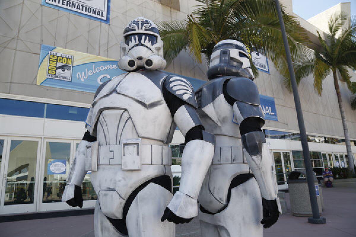 Visitors dressed as "Star Wars" storm troopers during this year's Comic-Con at the San Diego Convention Center. The center's expansion was approved Thursday by the California Coastal Commission.