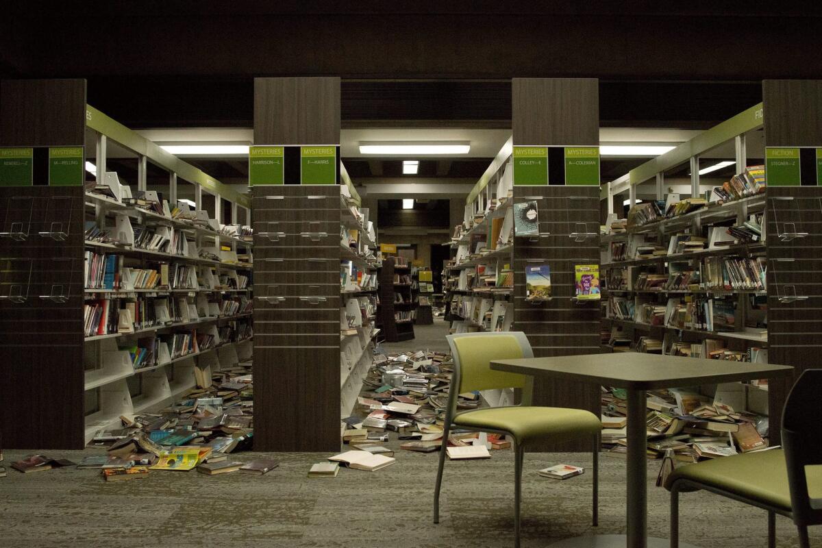 Books were thrown from shelves at the Napa Public Library after a magnitude 6.0. earthquake hit the area Sunday morning.