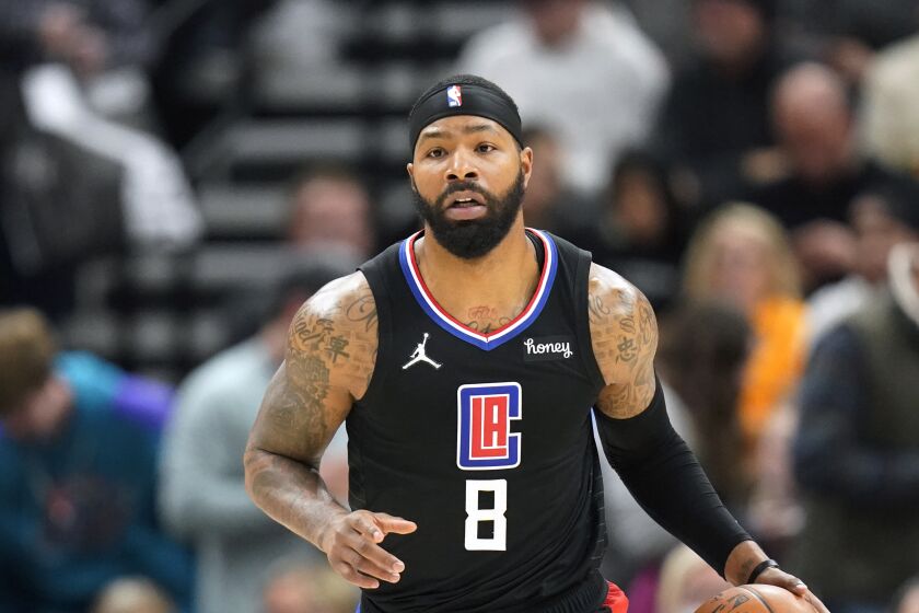 Los Angeles Clippers forward Marcus Morris Sr. (8) brings the ball up court.