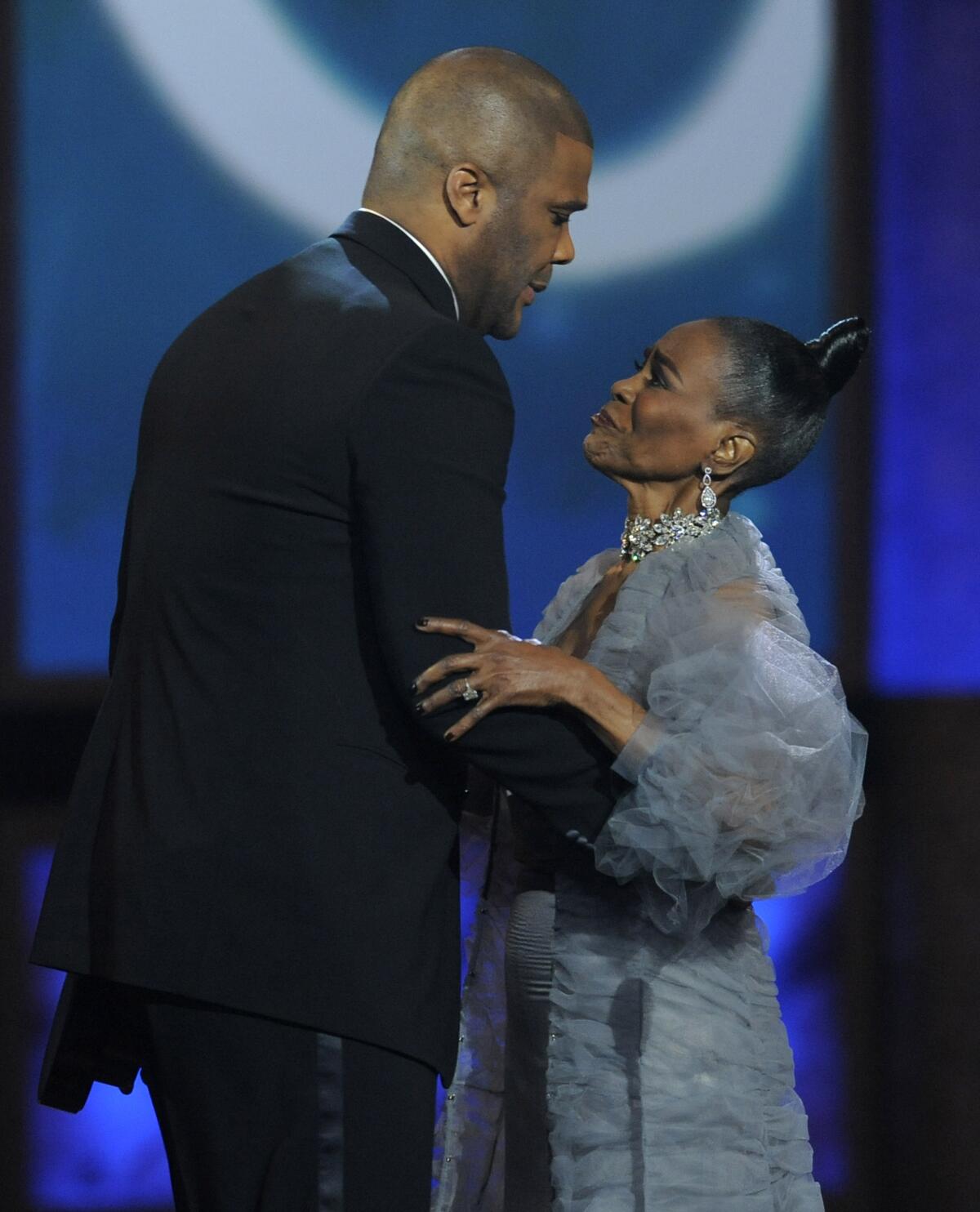 Tyler Perry hugs Cicely Tyson