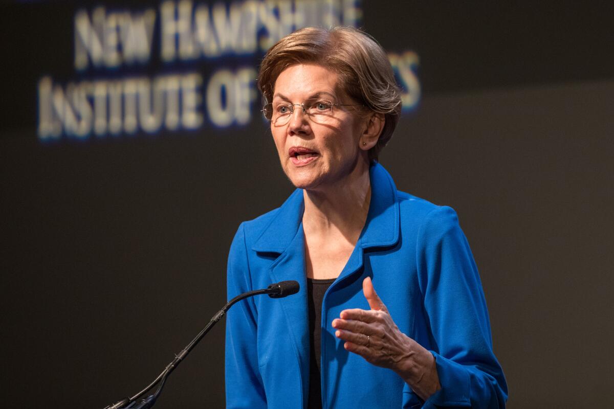 Democratic presidential candidate Sen. Elizabeth Warren delivers an economic policy speech in Manchester, N.H., on Thursday.