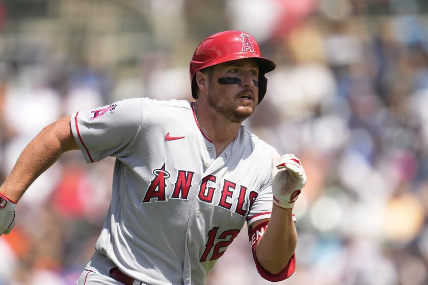Los Angeles Angels' Hunter Renfroe runs out a double against the Detroit Tigers in the fourth inning during the first baseball game of a doubleheader, Thursday, July 27, 2023, in Detroit. (AP Photo/Paul Sancya)