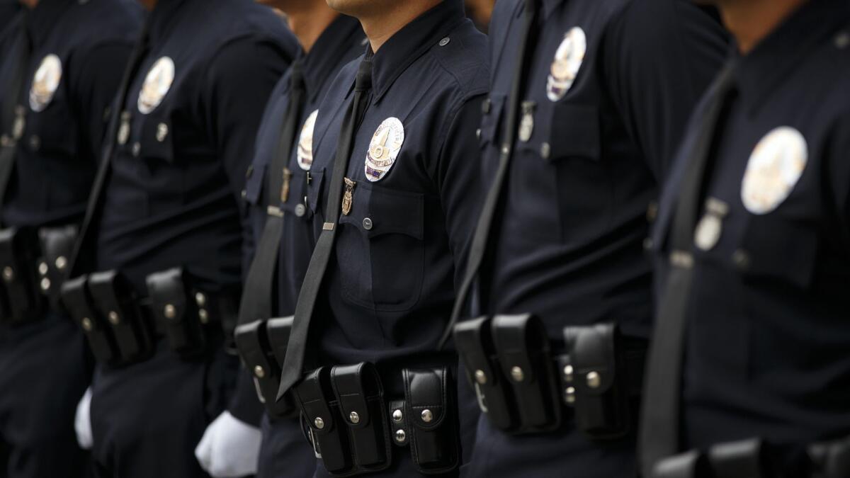 A Los Angeles Police commander and another department supervisor were arrested early Friday in an alcohol-related incident, marking the third and fourth arrests of LAPD officers in the past week.