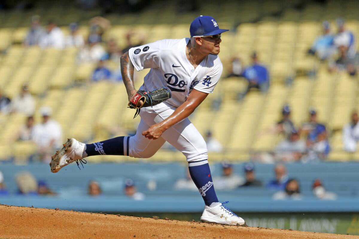 LOS ANGELES, CA - MAY 29: Los Angeles Dodgers starting pitcher Julio Urias (7) delivers a pitch.