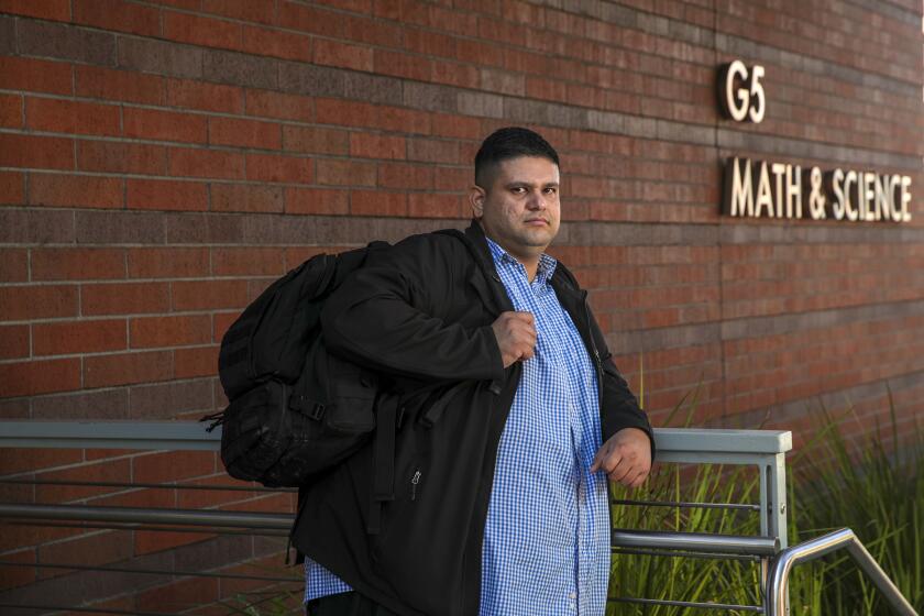 Los Angeles, CA - May 25: Paul Medina is frustrated by his inability to get into a college-level math class. Medina began in 2005 with remedial courses that did not count toward a degree or transfer credits, after a placement test showed advised him he was several classes below college level. He passed pre-algebra and high school-level algebra but got stuck in intermediate algebra. Twice, Medina dropped that class in frustration, giving up on college math for a few years, unsure he would ever pass the classes needed for a degree. Medina was photographed at East LA Community College on Wednesday, May 25, 2022 in Los Angeles, CA. (Irfan Khan / Los Angeles Times)