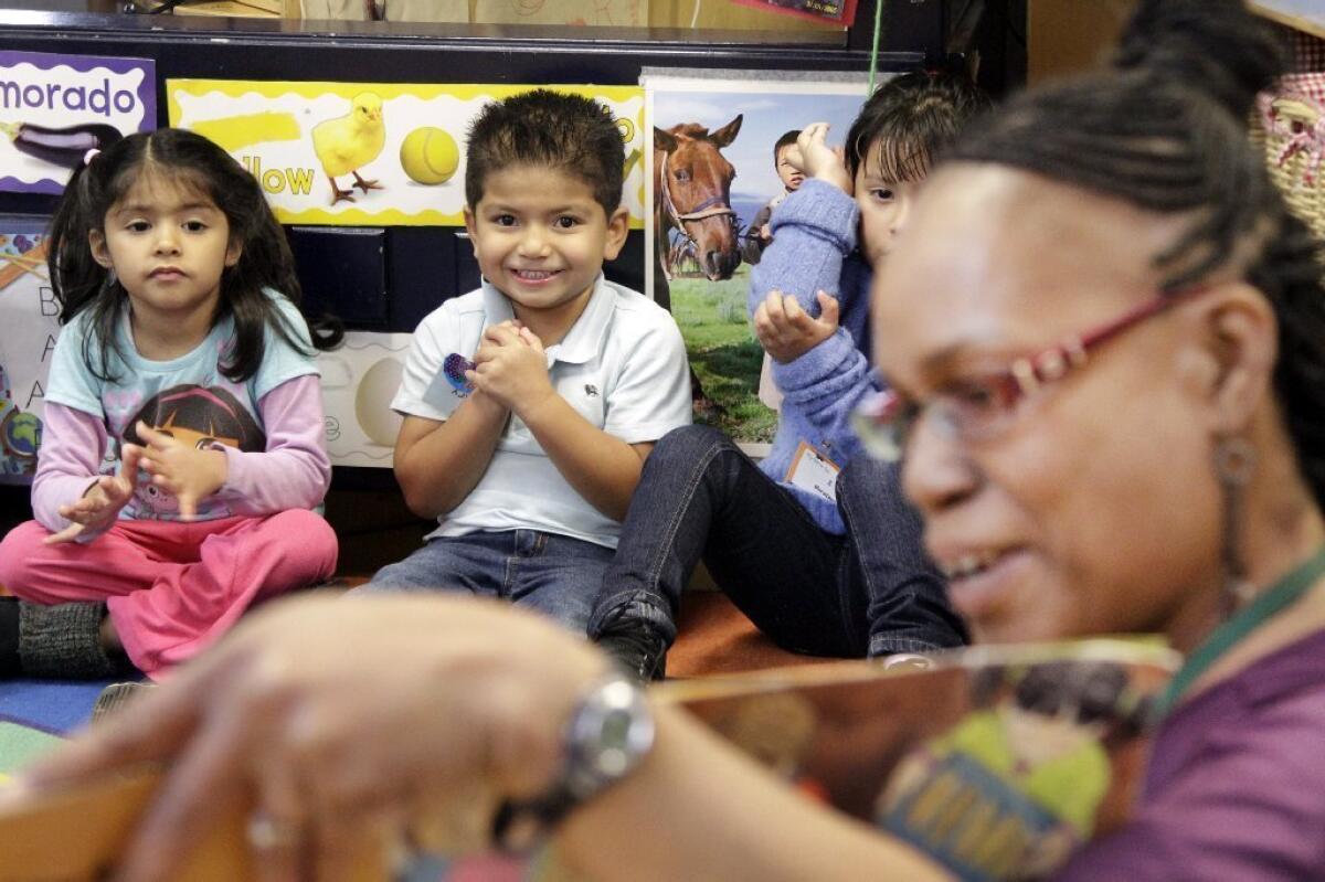 Preschool teacher Janet Matthews leads class as youngsters in a PACE Early Childhood Education program in Los Angeles pay rapt attention.