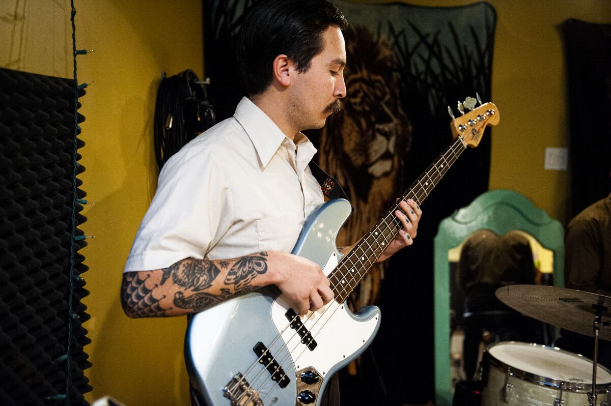 Sal Samano, who was previously in a garage rock band Fake Tides, plays bass for the Chicano Soul group.