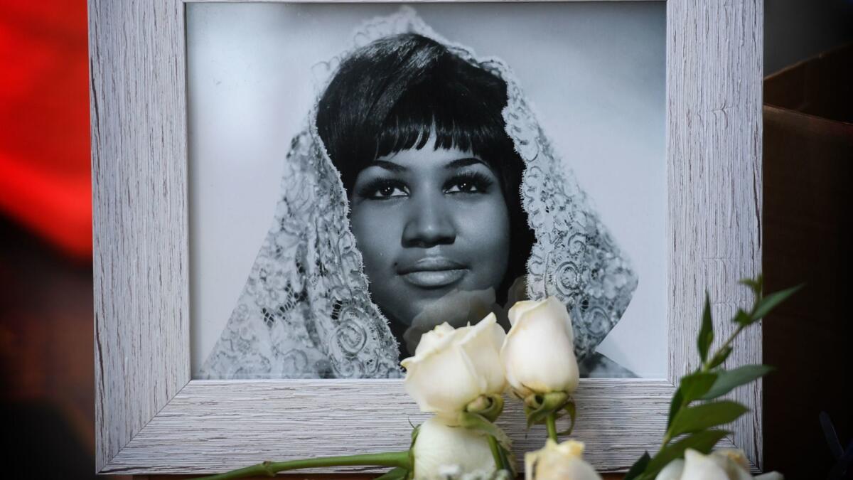 Flowers and tributes are placed on Aretha Franklin's star on the Hollywood Walk of Fame in the wake of her death.