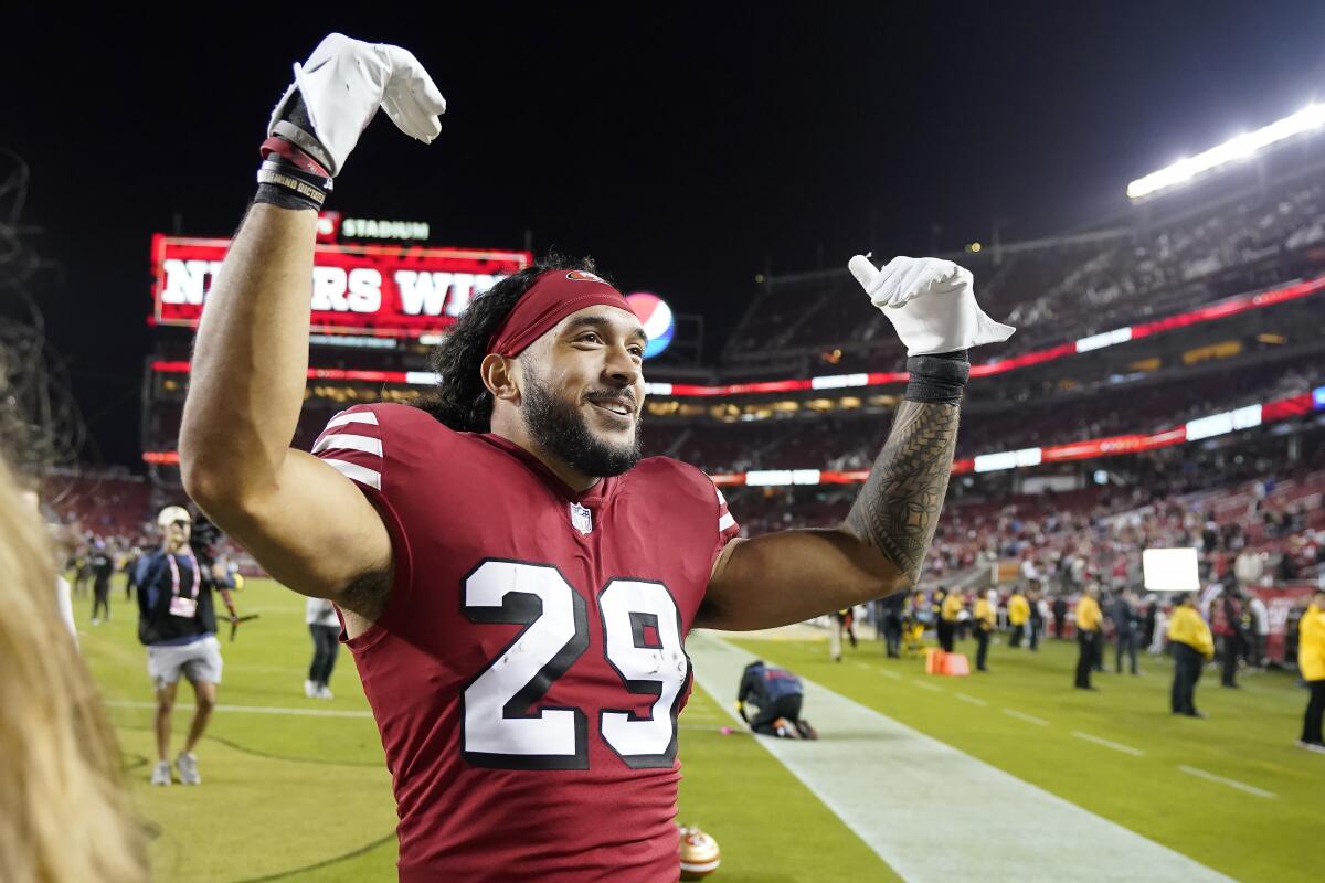 San Francisco 49ers safety Talanoa Hufanga celebrates after a 24-9 win over the Rams on Monday night.
