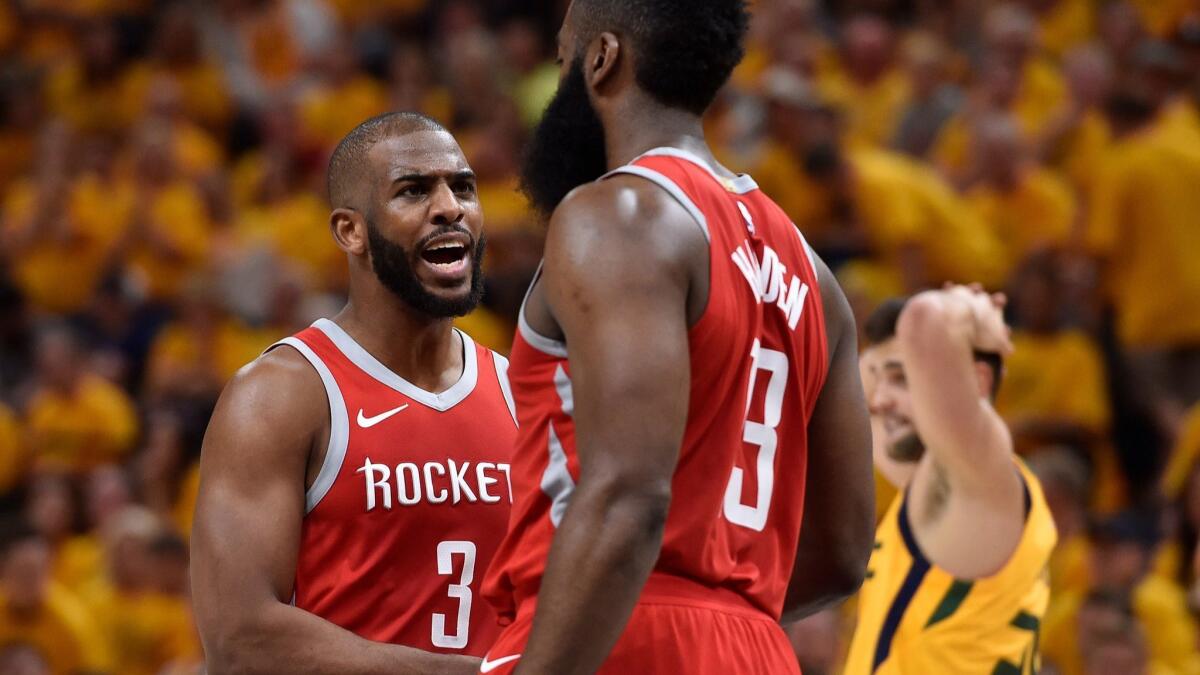 All-Stars Chris Paul, left, and James Harden have meshed offensively, helping Houston become a legitimate title contender this season.