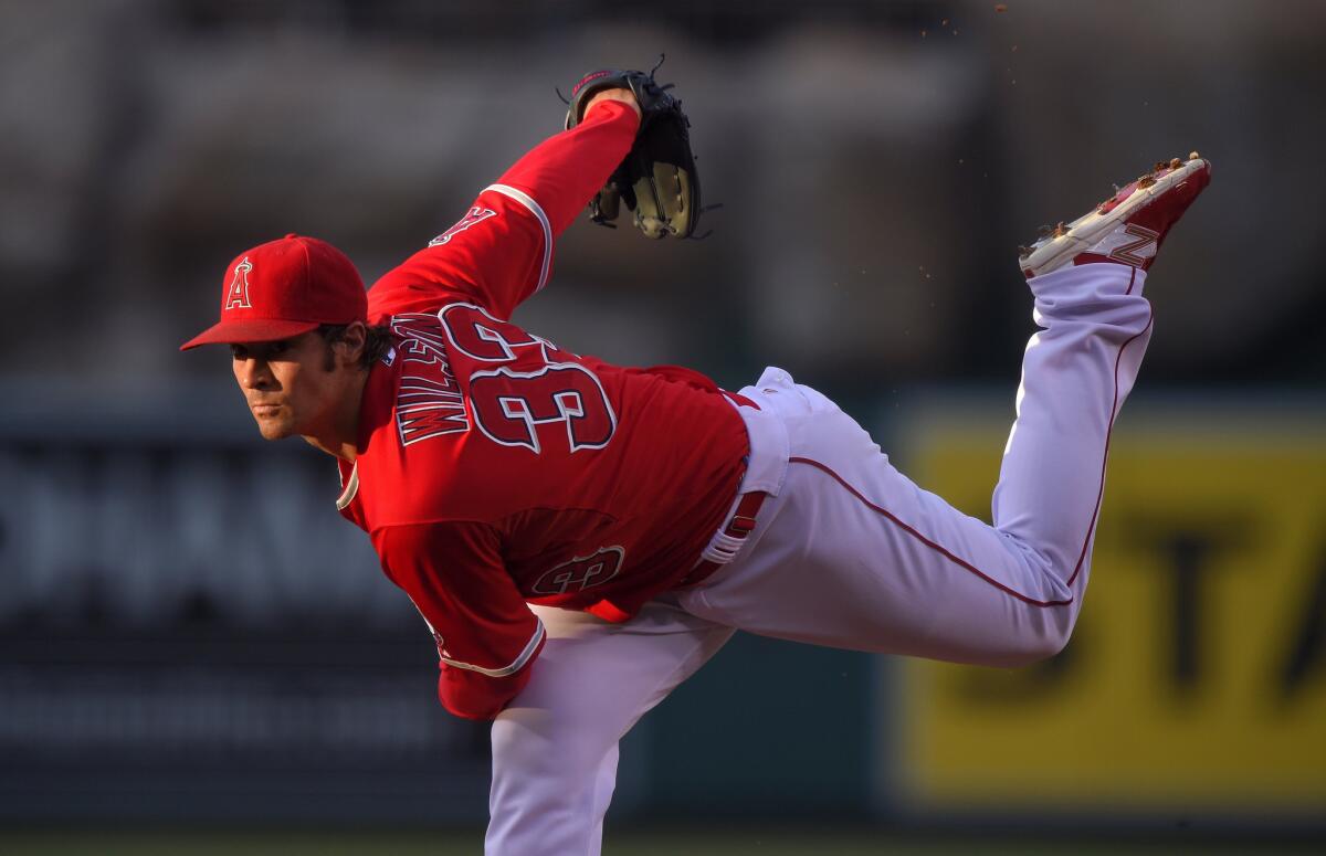 Angels starter C.J. Wilson gave up just two hits in seven innings Saturday night against Oakland.