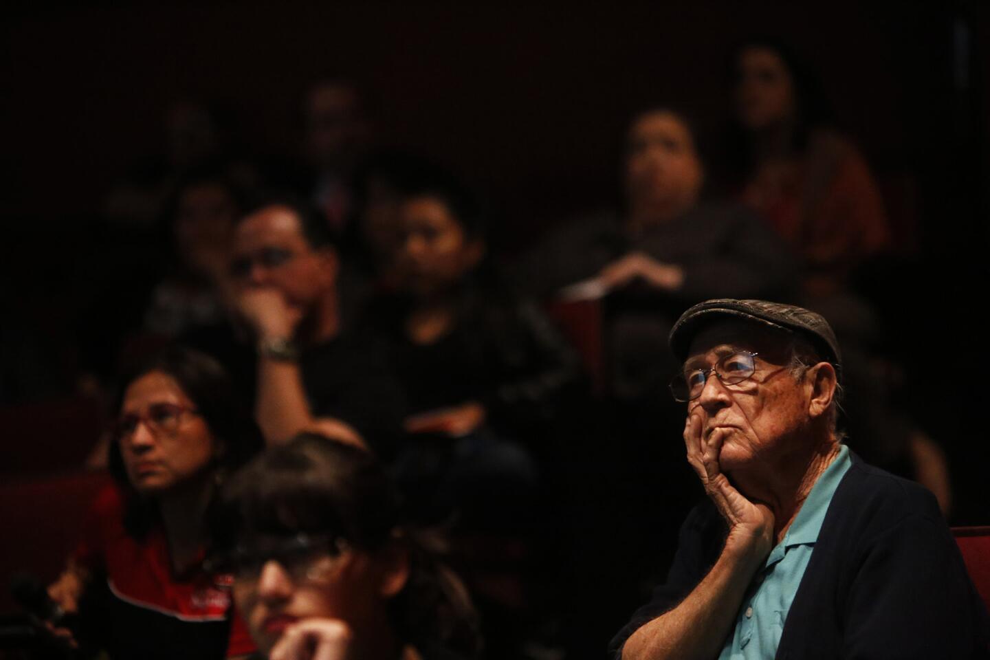 Jose Hernandez, a Chicano studies professor at Cal State Northridge, listens to the school's dean of students talk about plans to limit enrollment by setting higher admission standards.