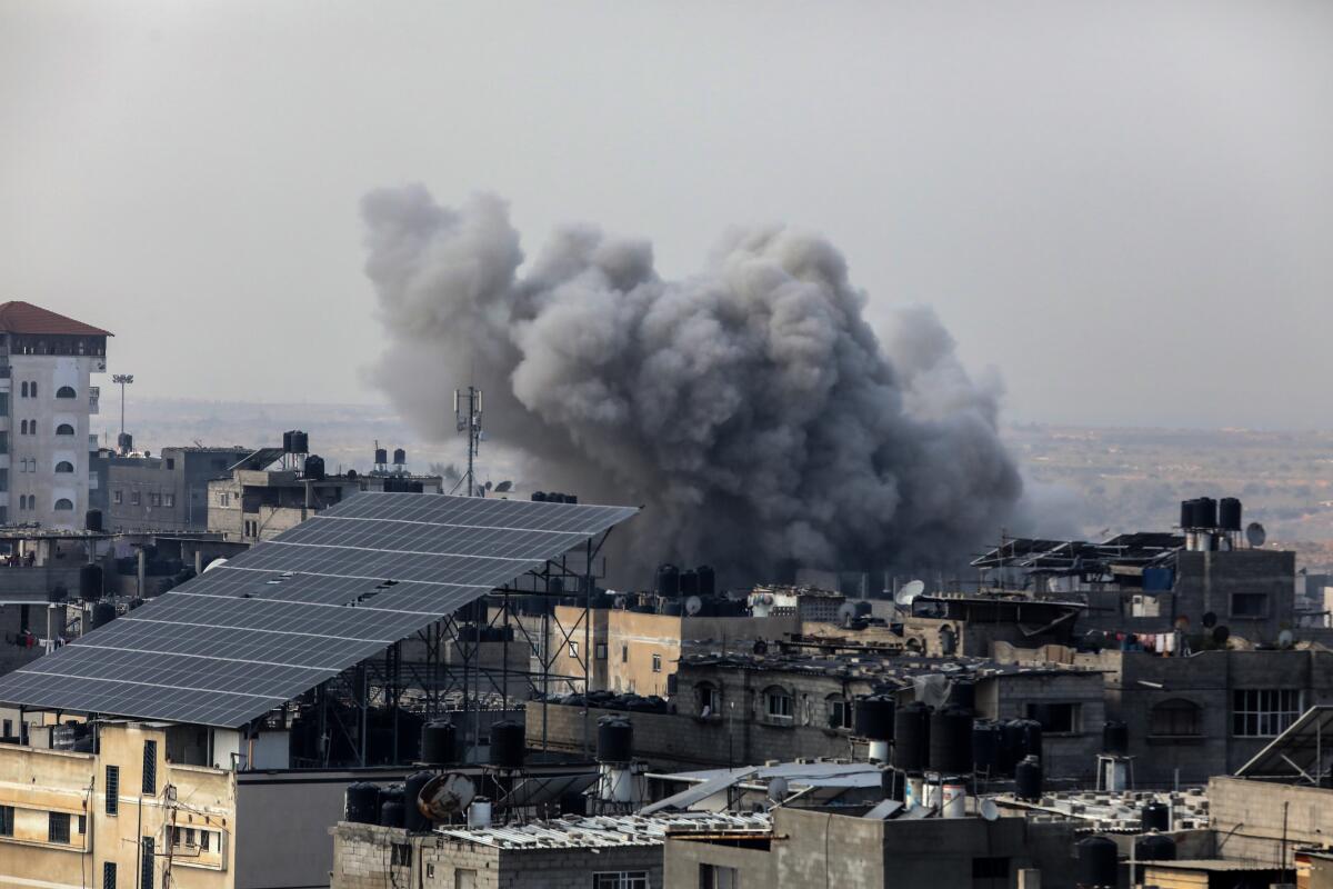 Smoke rises after Israeli attacks hit Rafah in the southern Gaza Strip on Friday.