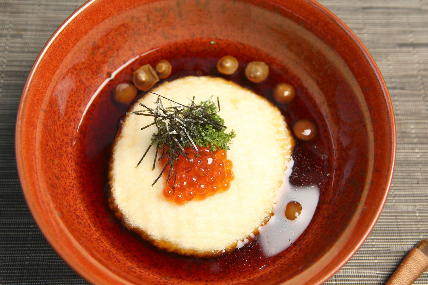 Home made agedashi tofu, deep-fried style, served with bonito-based broth.