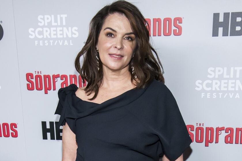 FILE - In this Jan. 9, 2019, file photo, Annabella Sciorra attends HBO's "The Sopranos" 20th anniversary at the SVA Theatre in New York. Sciorra is set to confront Harvey Weinstein at his New York City rape trial, more than a quarter-century after she says he pinned her to a bed and raped her. She is expected to testify Thursday, Jan. 23, 2020. (Photo by Charles Sykes/Invision/AP, File)