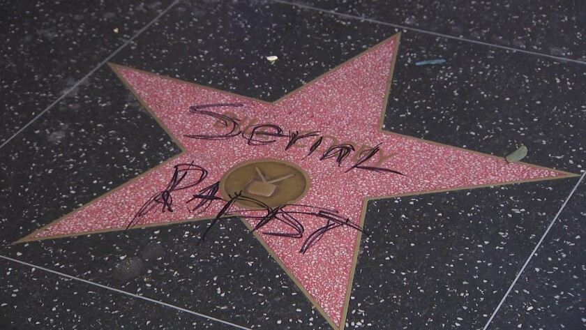 Vandals scrawl 'serial rapist' on Bill Cosby's star on ...