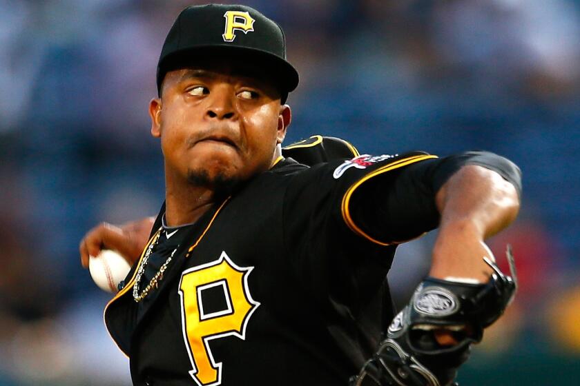 Pittsburgh Pirates pitcher Edinson Volquez delivers against the Atlanta Braves on Thursday. Volquez will be on the mound Wednesday when the Pirates play the San Francisco Giants in the National League wild-card game.