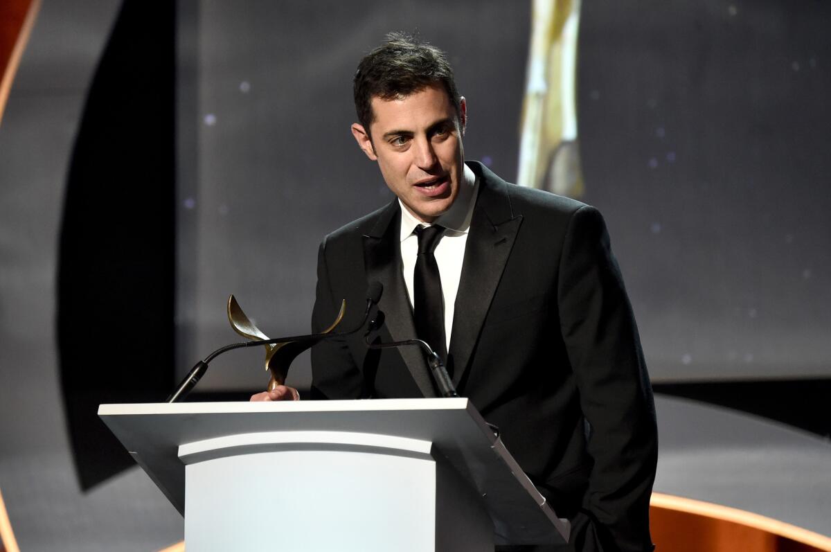 Writer Josh Singer accepts the original screenplay award for 'Spotlight' onstage during the 2016 Writers Guild Awards.