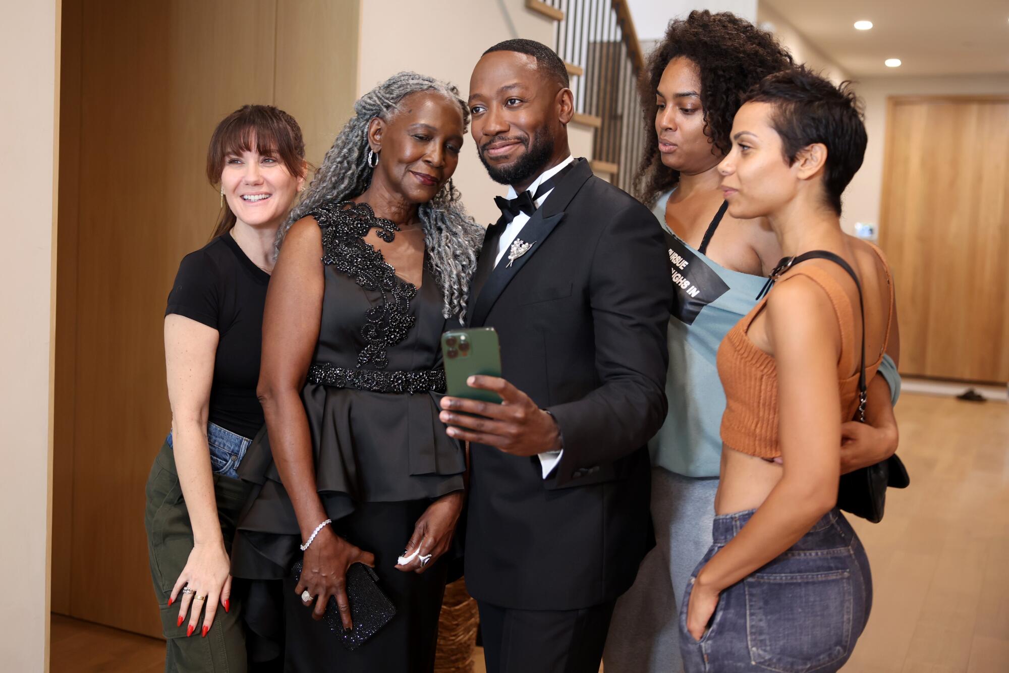 A group of people posing a photo.