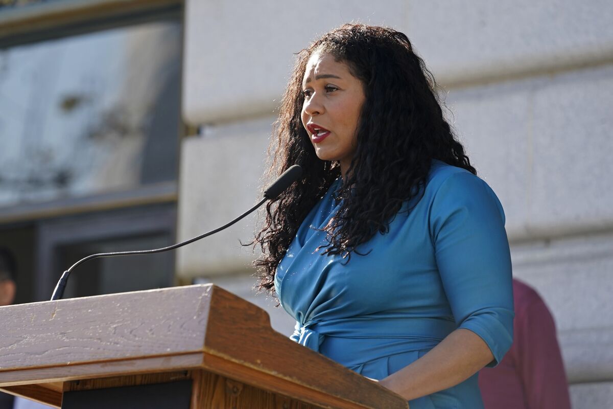FILE - San Francisco Mayor London Breed speaks during a briefing outside City Hall in San Francisco on Dec. 1, 2021. Breed said Wednesday, Oct. 5, 2022, that the city is cracking down on public drug use and rampant drug sales now that police have the support of a new district attorney and a supervisor, both of whom were appointed by Breed, and who face election in November. (AP Photo/Eric Risberg, File)