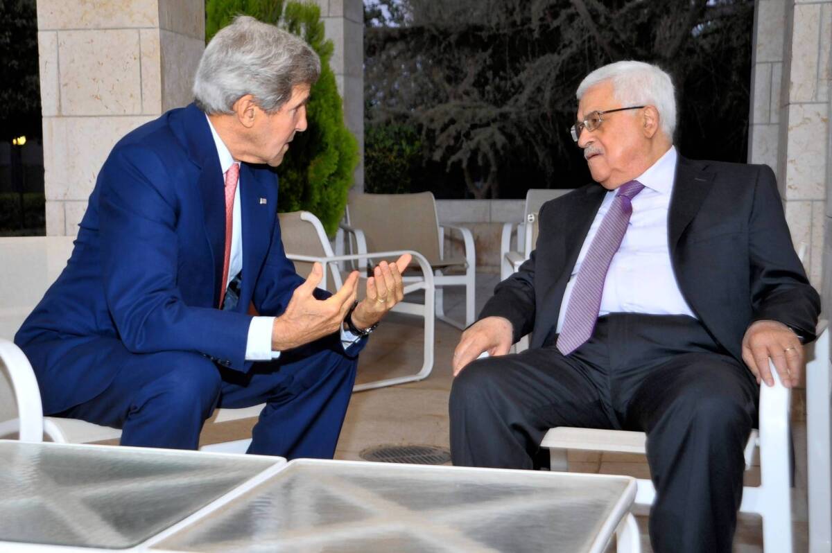 U.S. Secretary of State John F. Kerry, left, and Palestinian Authority President Mahmoud Abbas in Amman, Jordan, where they held two rounds of talks.
